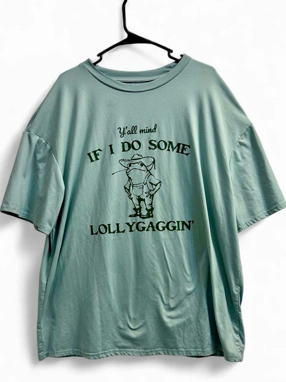 Green farmer frog graphic tee